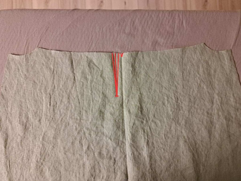 picture of back skirt piece with placket marks indicated in red