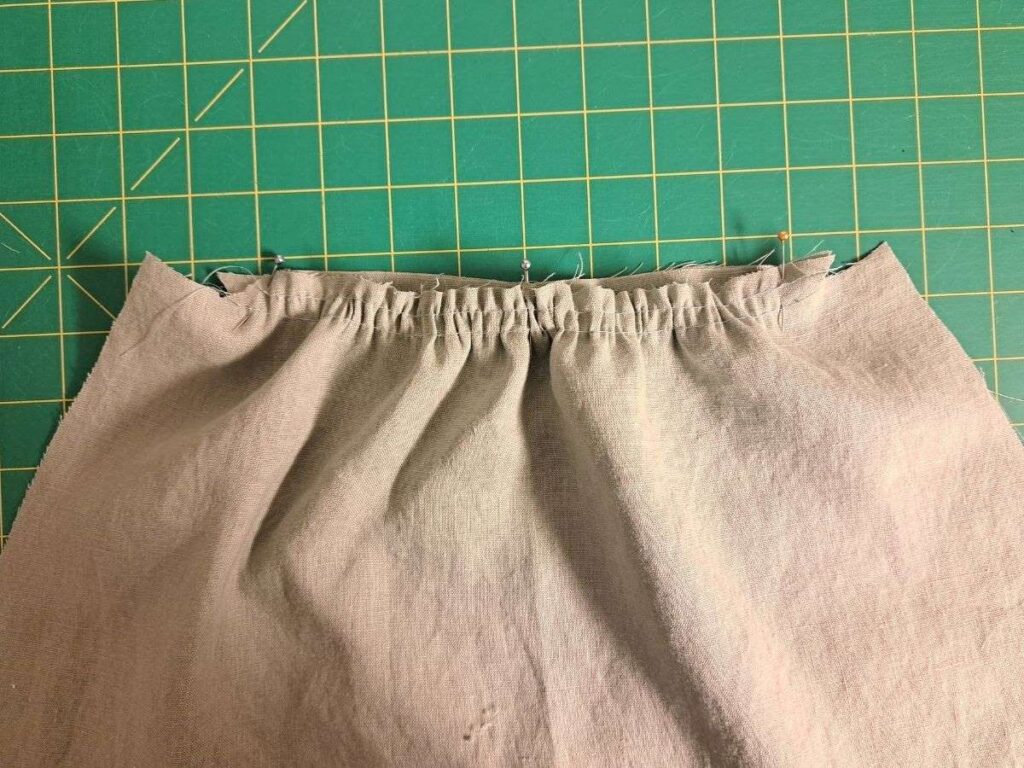 gathered skirt pinned onto bodice