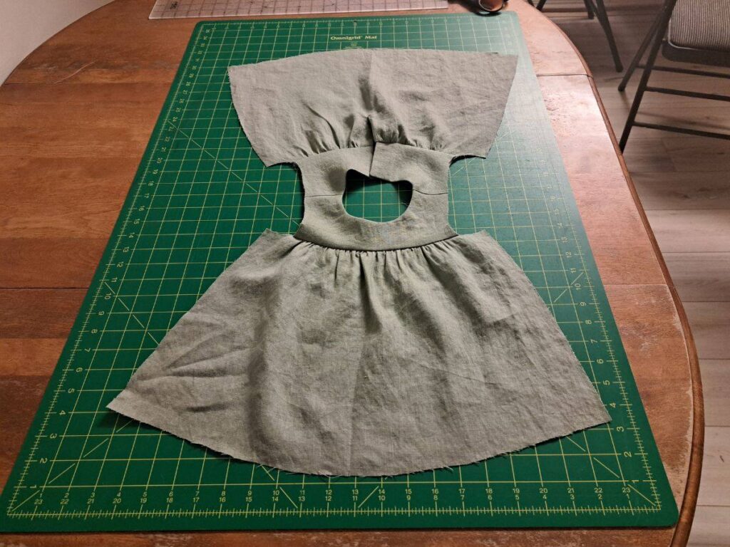 dress laying open on table